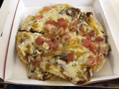 In Tim’s Big Book of Restaurant Reviews, the Taco Bell of Middlesboro Has Earned an Over All Rating of 6.2 Out of 10 A close up of a plate of food