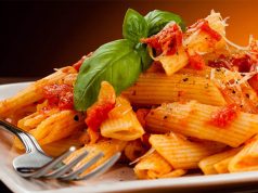 Pasta Recipes with Indian Touch A plate of food with a fork
